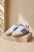 Tenis Samba ADI Blanco con franjas en Azul